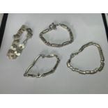 FOUR MARKED SILVER BRACELETS