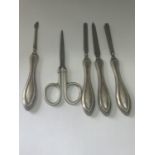 A HALLMARKED BIRMINGHAM SILVER HANDLED LADIES MANICURE SET