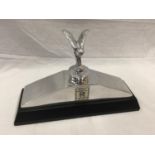 A CHROME ROLLS ROYCE RADIATOR TOP STYLE PLINTH WITH TOP MOUNTED SPIRIT OF ECSTASY FIGURE AND