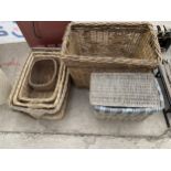 AN ASSORTMENT OF LARGE WICKER BASKETS TO INCLUDE A LARGE LOG BASKET ETC