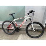 A CARRARO GRUNGE MOUNTAIN BIKE WITH FRONT SUSPENSION AND 21 SPEED SHIMANO GEAR SYSTEM
