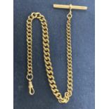 AN ANTIQUE HALLMARKED 18CT GOLD WATCH CHAIN WITH SPINNER AND T-BAR ON A CURB LINK CHAIN, EACH LINK