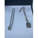 TWO TWO HEAVY SILVER NECKLACES ONE WITH A RECTANGULAR LOCKET