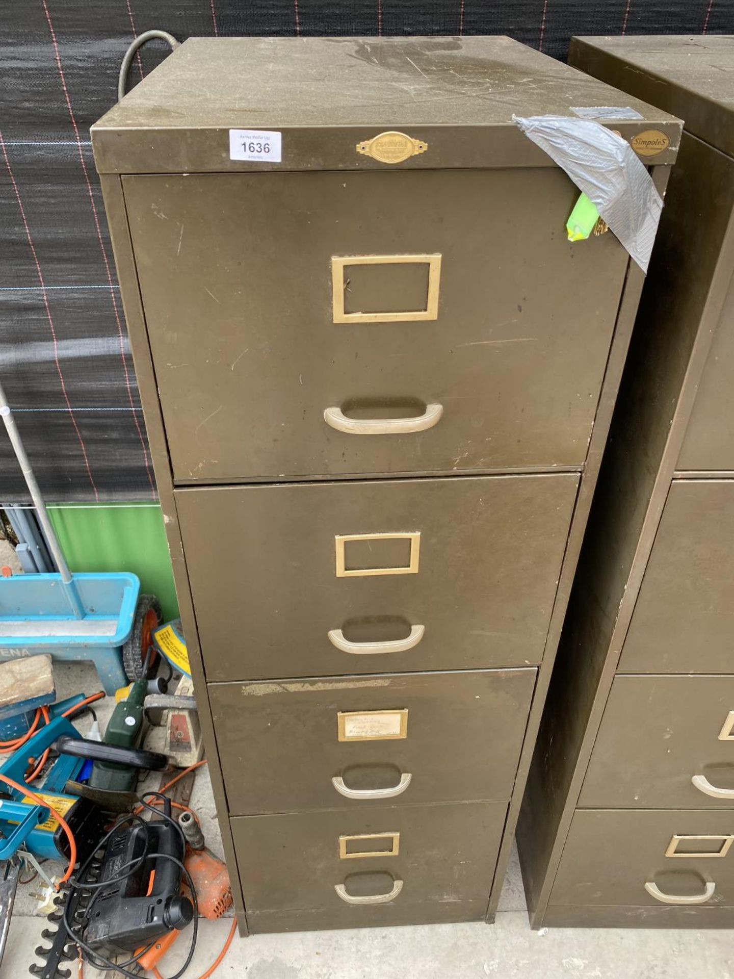 A VINTAGE FOUR DRAWER FILING CABINET