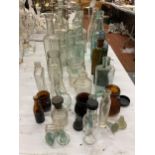 A LARGE QUANTITY OF VINTAGE BOTTLES TO INCLUDE SCHWEPPES, PEPSI, UNIGATE, CHEMIST BOTTLES, ETC, MANY