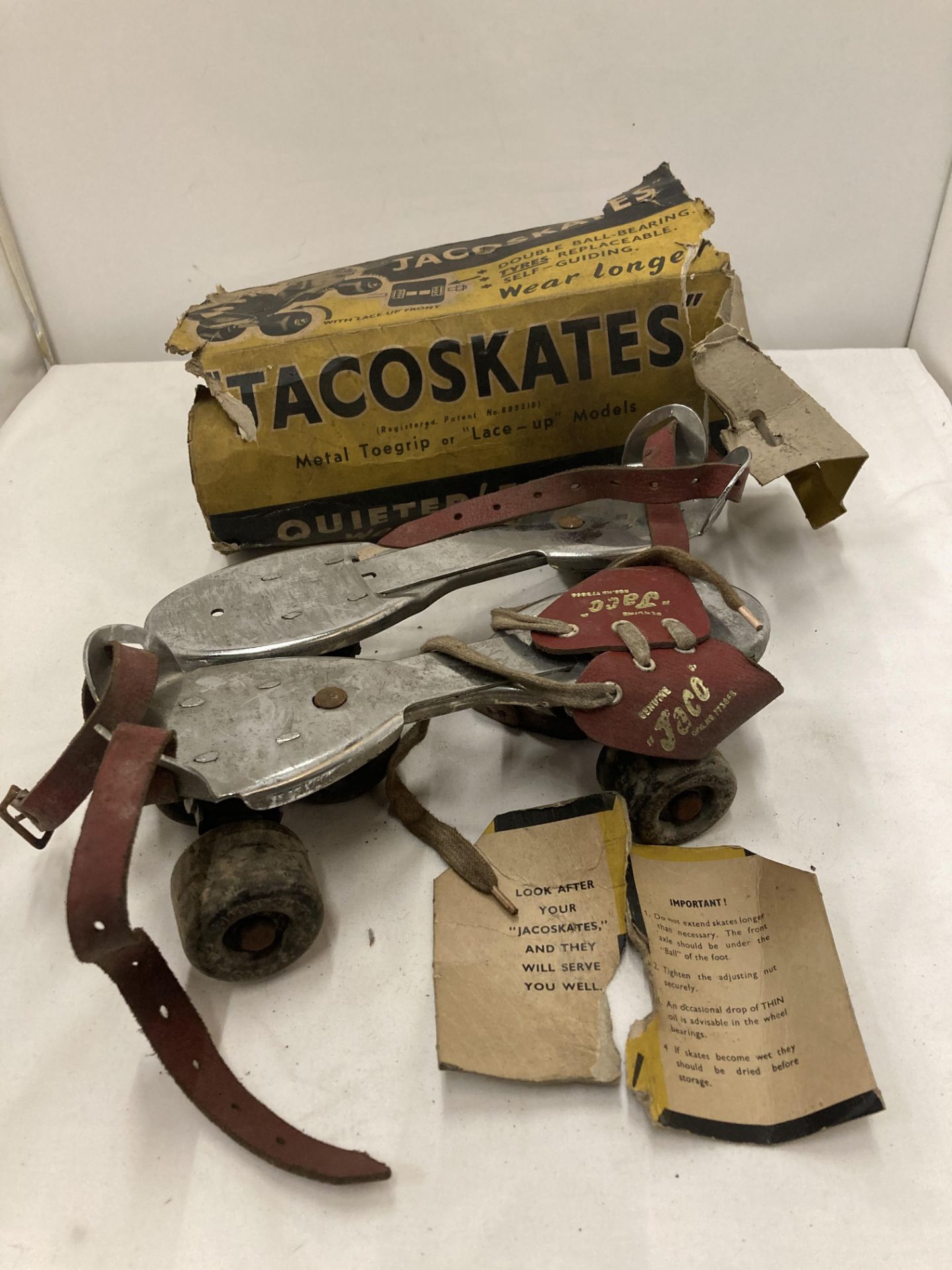 A PAIR OF VINTAGE 'JACOSKATES' ROLLER SKATES IN ORIGINAL BOX