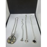 FOUR MARKED SILVER NECKLACES WITH PENDANTS TO INCLUDE A LARGE GREEN STONE, A GONDOLA,BLACK STONE AND