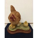 A LARGE BORDER ARTS CERAMIC FIGURE OF A HEN & CHICKS TITLED "BIRDS" BY RUSSELL WILLIS 739464 ON A