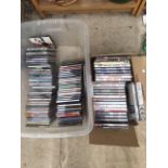 AN ASSORTMENT OF CDS AND DVDS