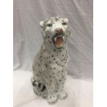 A VERY LARGE ITALIAN MADE CERAMIC SNOW LEOPARD INSCRIBED WITH INDISTINCT SIGNATURE TO BASE, HAS SOME