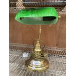 A VINTAGE BANKERS LAMP WITH GREEN SHADES