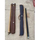 TWO 1970'S SNOOKER CUES WITH CARRY CASES