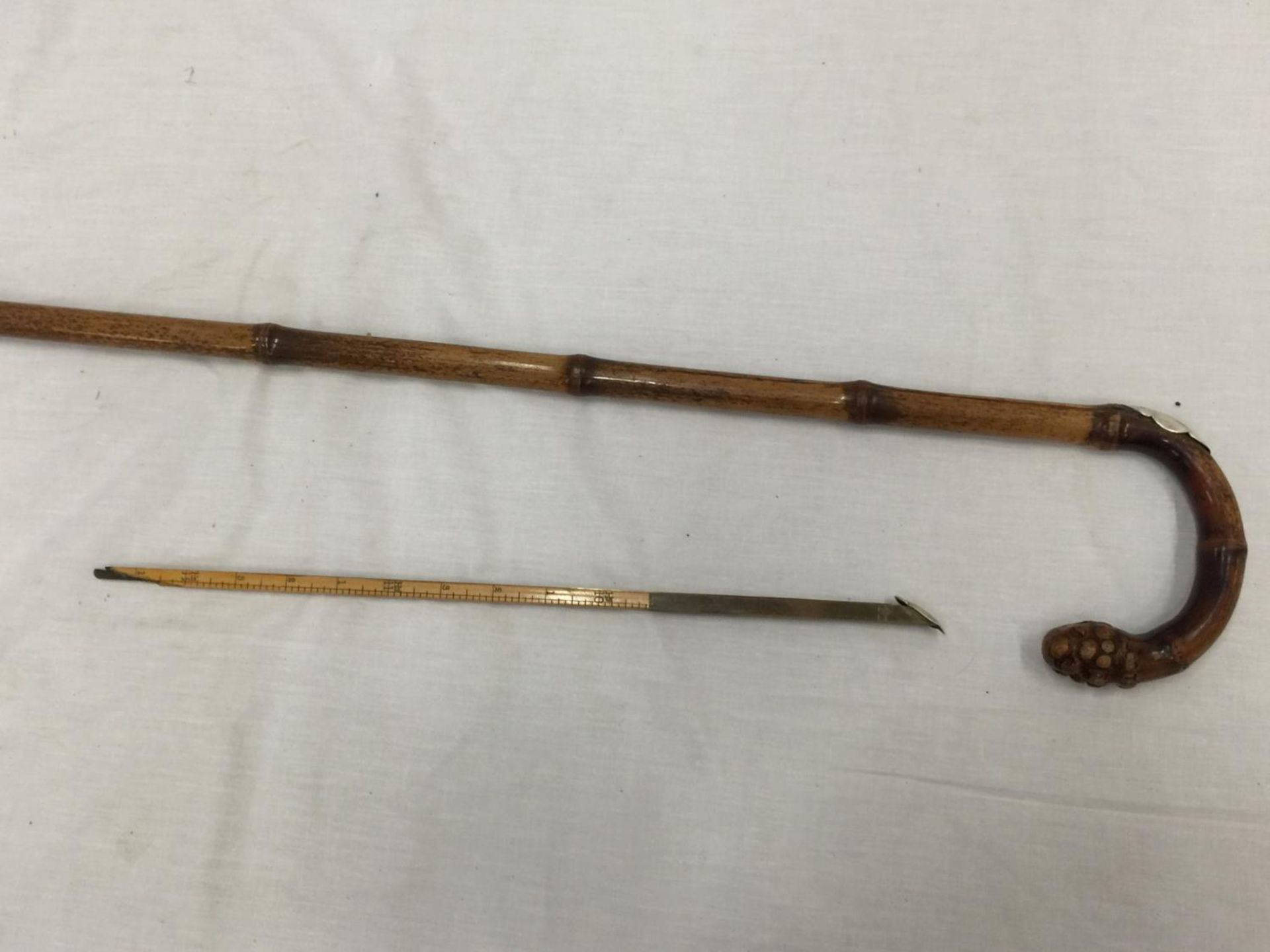 A SILVER TOPPED WALKING CANE MARKED H.S. GUARDS CLUB AND CONSEALED HORSE MEASURING STICK A/F - Image 11 of 16