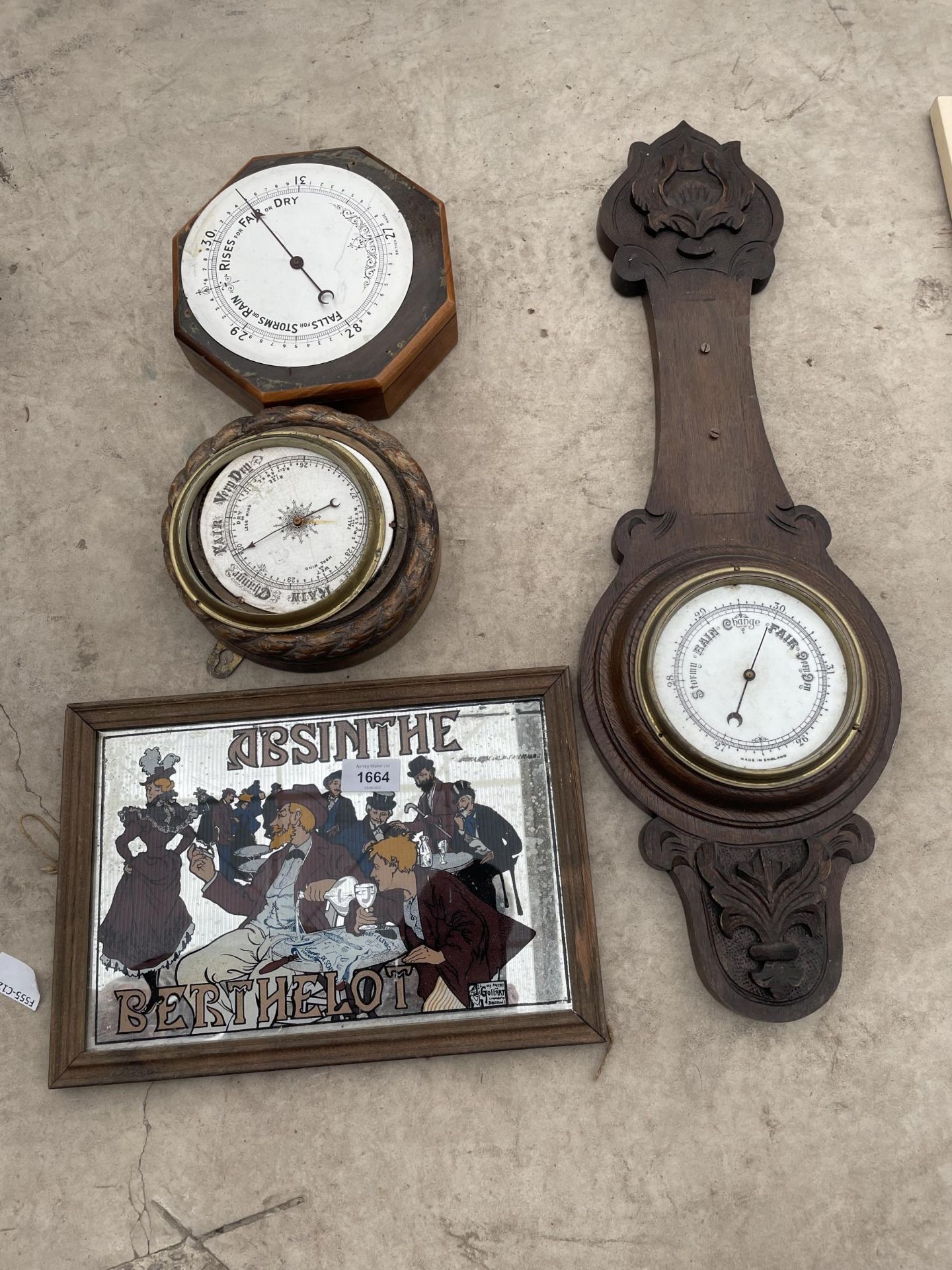 THREE BEROMETERS AND AN ABSINTHE ADVERTISING MIRROR