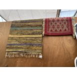 TWO SMALL FRINGED PATTERNED RUGS