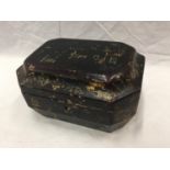 A CHINOISERIE DECORATED SARCOPHAGUS SHAPED BOX WITH ORIENTAL STYLING