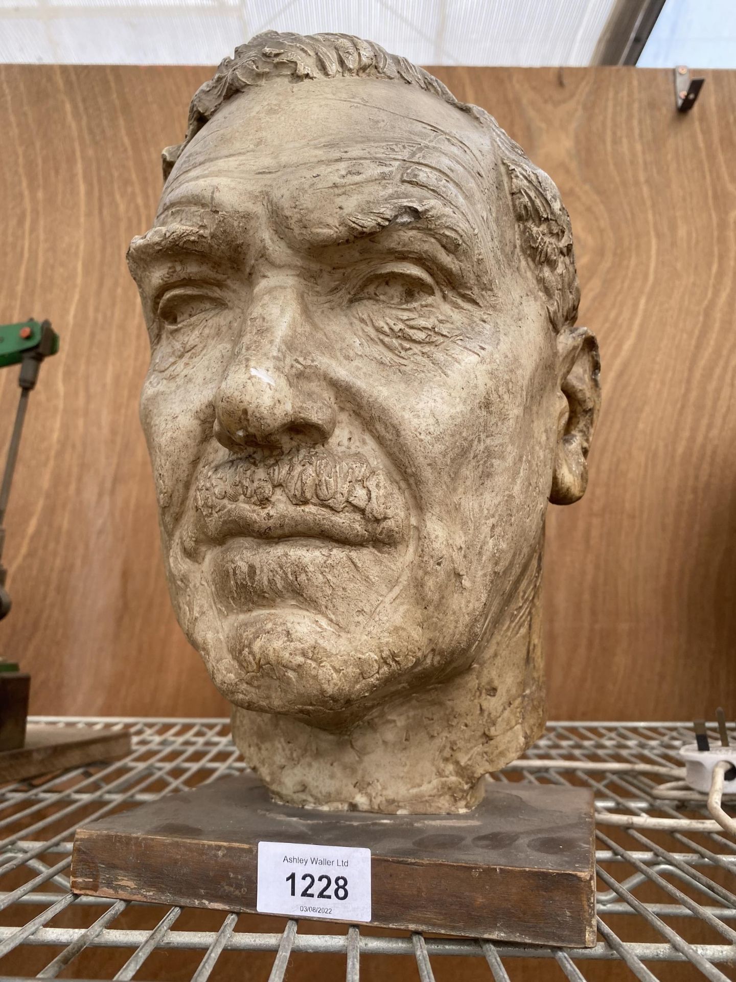 A VINTAGE RESIN BUST OF A MAN