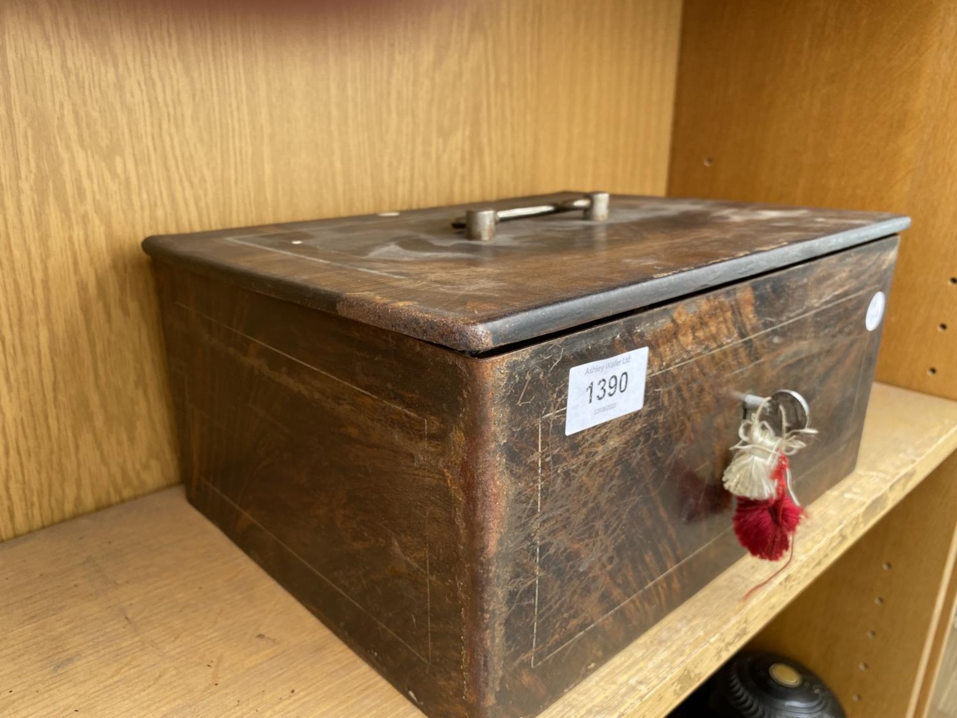 A VINTAGE METAL CASH TIN WITH DOUBLE LOCKING MECHANISM - Image 2 of 3