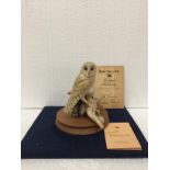 A BORDER FINE ARTS BARN OWL SITTING ON A STUMP ON A WOODEN STAND - HAND MADE IN SCOTLAND AND
