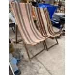 TWO FOLDING WOODEN FRAMED DECK CHAIRS