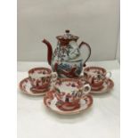 A SIGNED ORIENTAL TEA SET COMPRISING OF A TEAPOT AND THREE CUPS AND SAUCERS