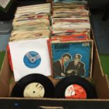 A BOX CONTAINING OVER 200 1960'S SINGLE VINYL RECORDS