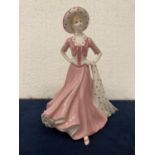 A BONE CHINA COALPORT LADY FIGURINE HAND DECORATED AND MODELLED BY JACK GLYNN "SENTIMENTS GOOD LUCK"