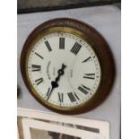 A SYNCHRONOME ELECTRIC SLAVE CLOCK WITH WOODEN AND BRASS FRAME. GLASS A/F