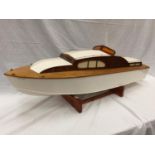 A LARGE REMOTE CONTROL MOTORISED MODEL OF A WOODEN BOAT 'SEA QUEEN' ON A WOODEN BASE WITH HITEC