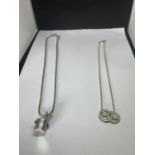 TWO MARKED SILVER NECKLACES ONE WITH A CHAMAGNE BUCKET AND BOTTLE PENDANT