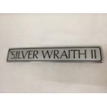 A ROLLS ROYCE SILVER WRAITH II SIGN 19.5CM X 3.5CM