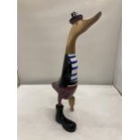 A WOODEN 'PIRATE' DUCK WITH A PEG LEG HEIGHT 39.5CM