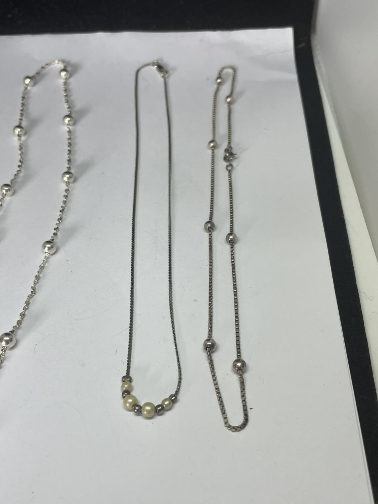 FOUR SILVER NECKLACES WITH BALL DESIGN - Image 3 of 5