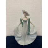 A COALPORT LADIES OF FASHION FIGURINE MODELLED BY JOHN BROMLEY AND DECORATED BY HAND - 22 CM