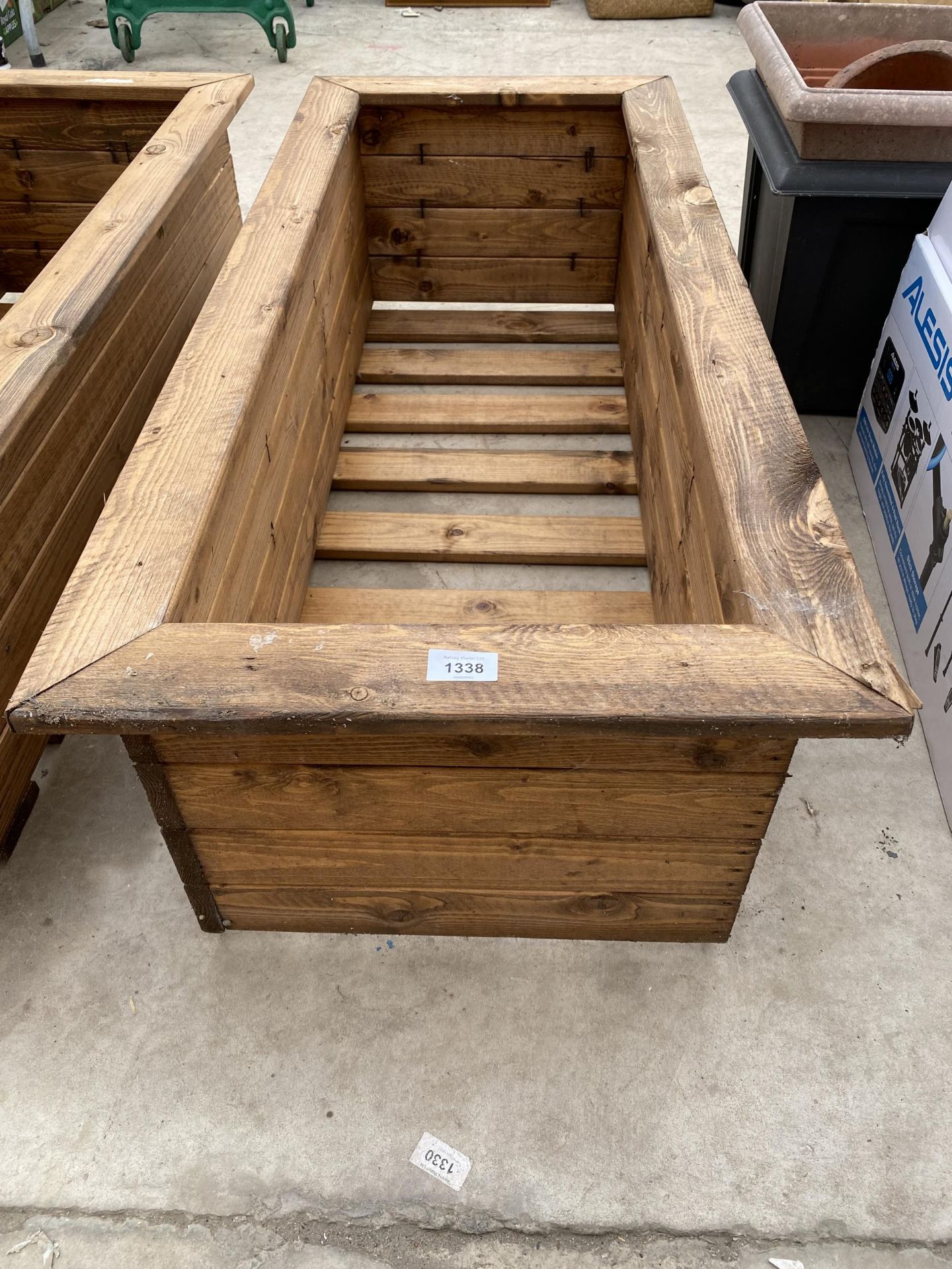 A LARGE AS NEW CHARLES TAYLOR STYLE WOODEN PLANTER TROUGH
