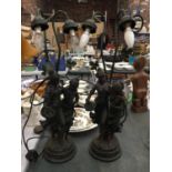 A PAIR OF RESIN TABLE LAMPS, EACH WITH TWO BULBS WITH LADY DECORATION, HEIGHT 66CM