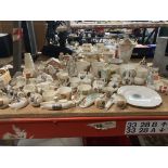 A LARGE QUANTITY OF CRESTED WARE TO INCLUDE CUPS, JUGS, BOWLS, ETC