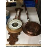 AN OAK CASED BAROMETER WITH ROCOCO STYLE CARVING HEIGHT 86CM - GLASS BROKEN AND A COPPER WITH