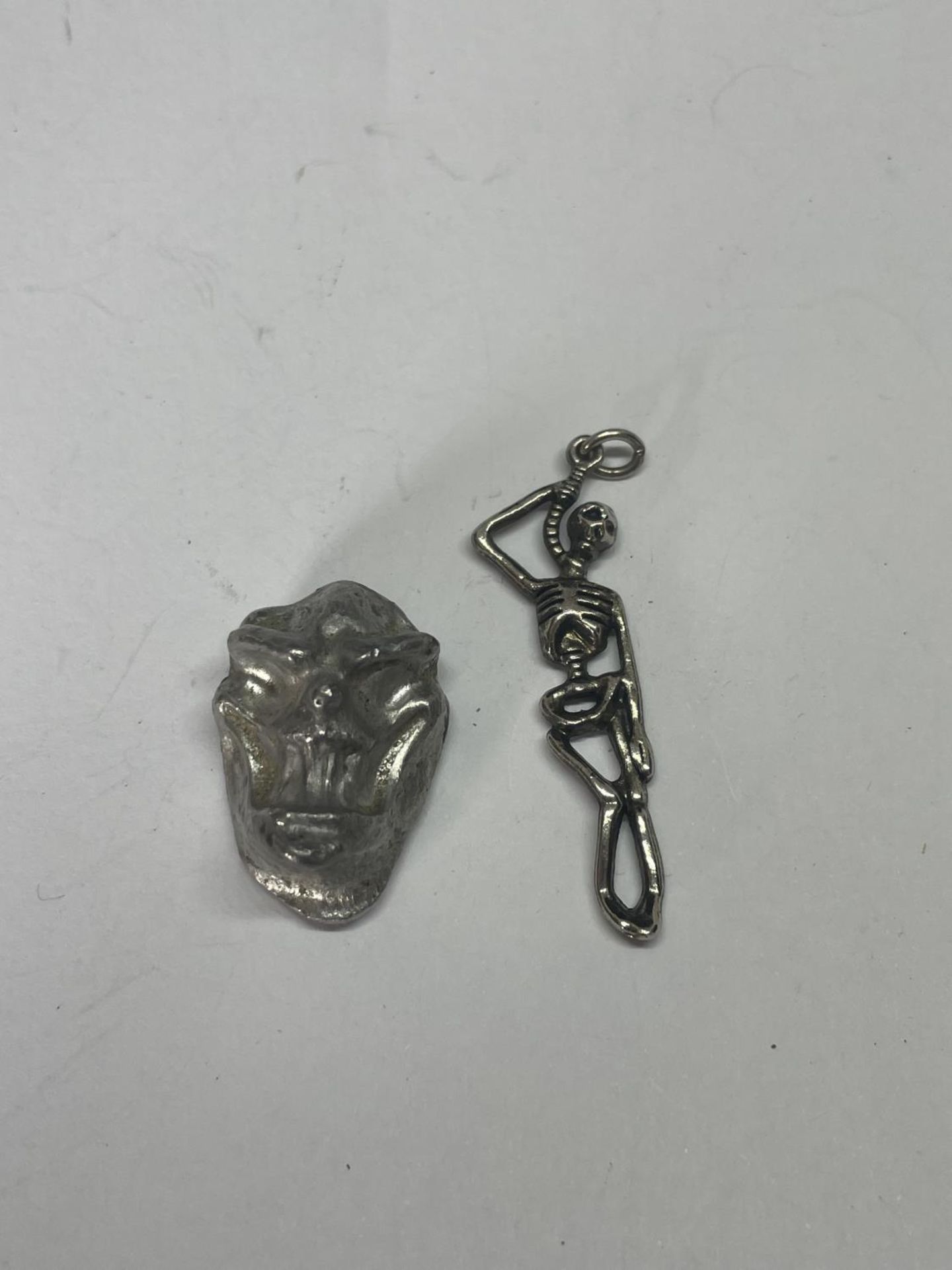 A SILVER SKULL AND SKELETON - Image 2 of 3