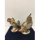 A PAIR OF VINTAGE CERAMIC FIGHTING ROOSTERS MADE IN EAST GERMANY PRE 1989