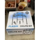 A NEW AND BOXED UNUSED ALESIS DMLITE ELECTRONIC DRUMSET WITH FOLDING RACK