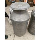 A STAINLESS STEEL MILK CHURN WITH LID