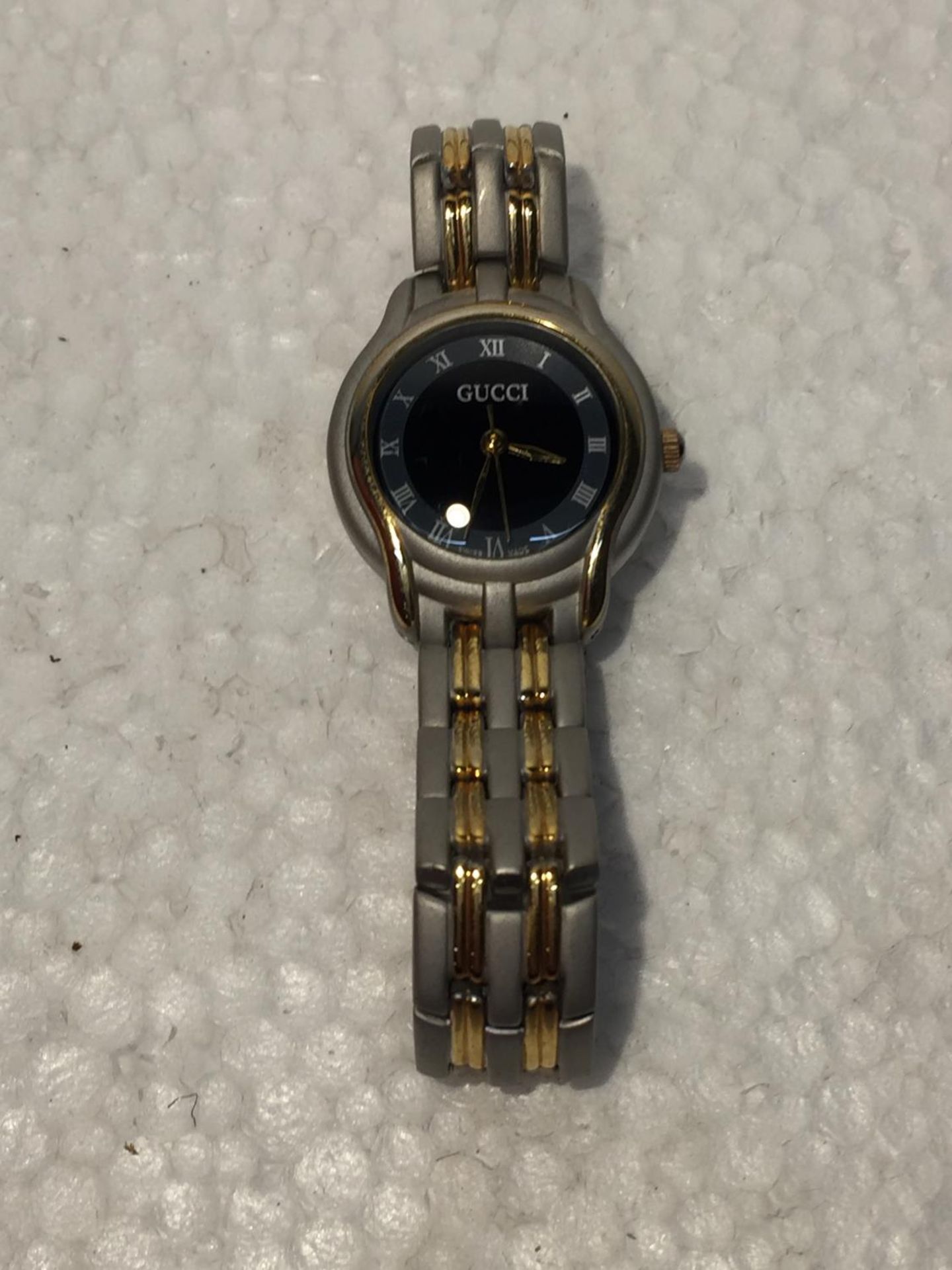 A FASHION WRISTWATCH WORKING AT TIME OF CATALOGUING