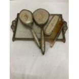 A LACE EMBROIDERY DRESSING TABLE TRAY WITH BRUSHES, MIRROR AND COMB ALL WITH BACK EMBROIDERY