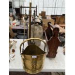 AN ASSORTMENT OF ITEMS TO INCLUDE A BRASS COAL BUCKET, A MAGAZINE RACK AND A COMPANION SET ETC