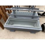 A PAIR OF WOODEN TROUGH PLANTERS WITH PLASTIC INSERTS