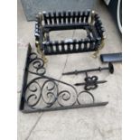 A DECORATIVE CAST IRON FIRE GRATE AND TWO WALL BRACKETS