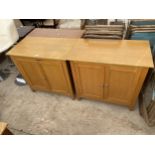 A PAIR OF MODERN OAK TWO DOOR CABINETS