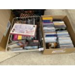 AN ASSORTMENT OF CDS AND CASSETTE TAPES