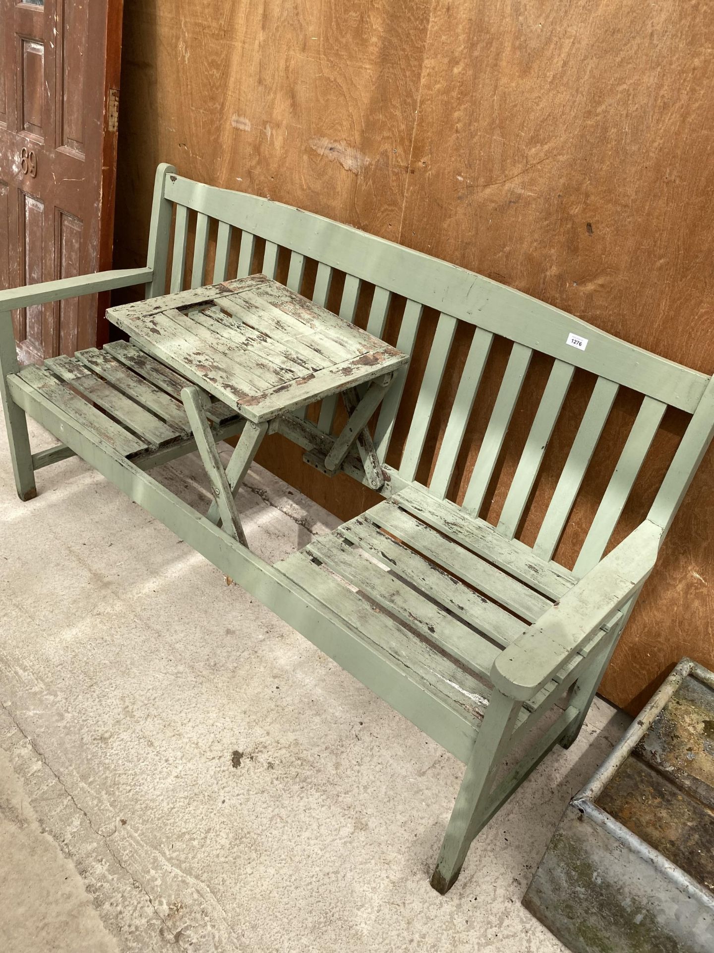 A WOODEN SLATTED GARDEN BENCH - Image 3 of 3